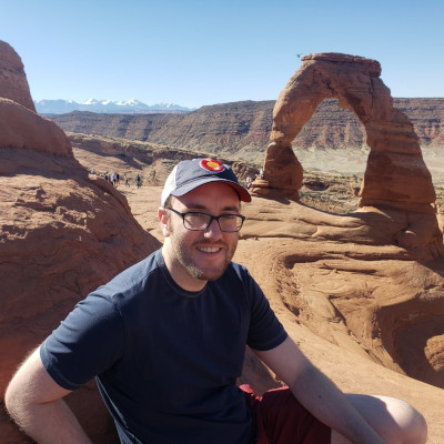 Teddy sitting in Arches National Park