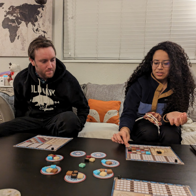 Teddy and a friend playing a board game